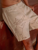 Beige linen cats embroidered shorts